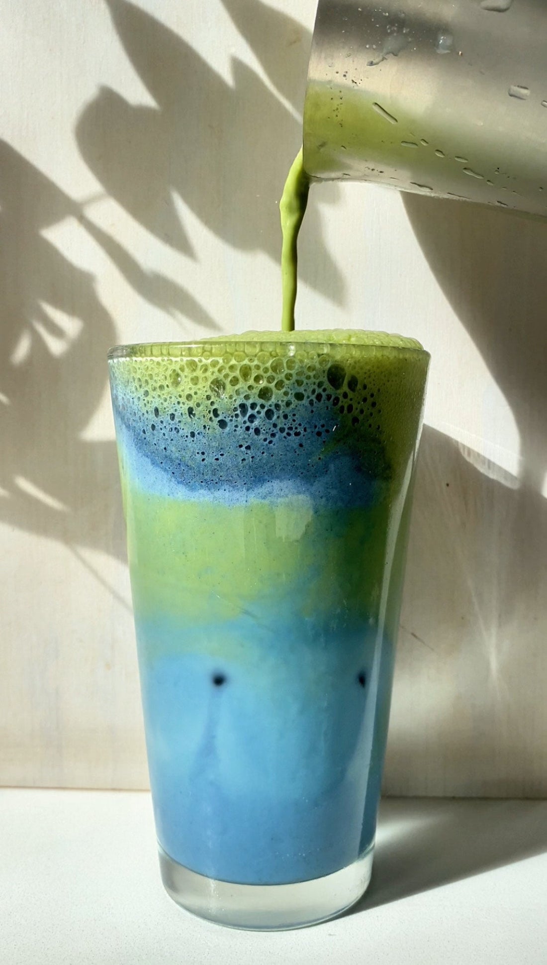 organic greens powder and blue butterfly pea powder as an iced latte – Goddess Greens NZ