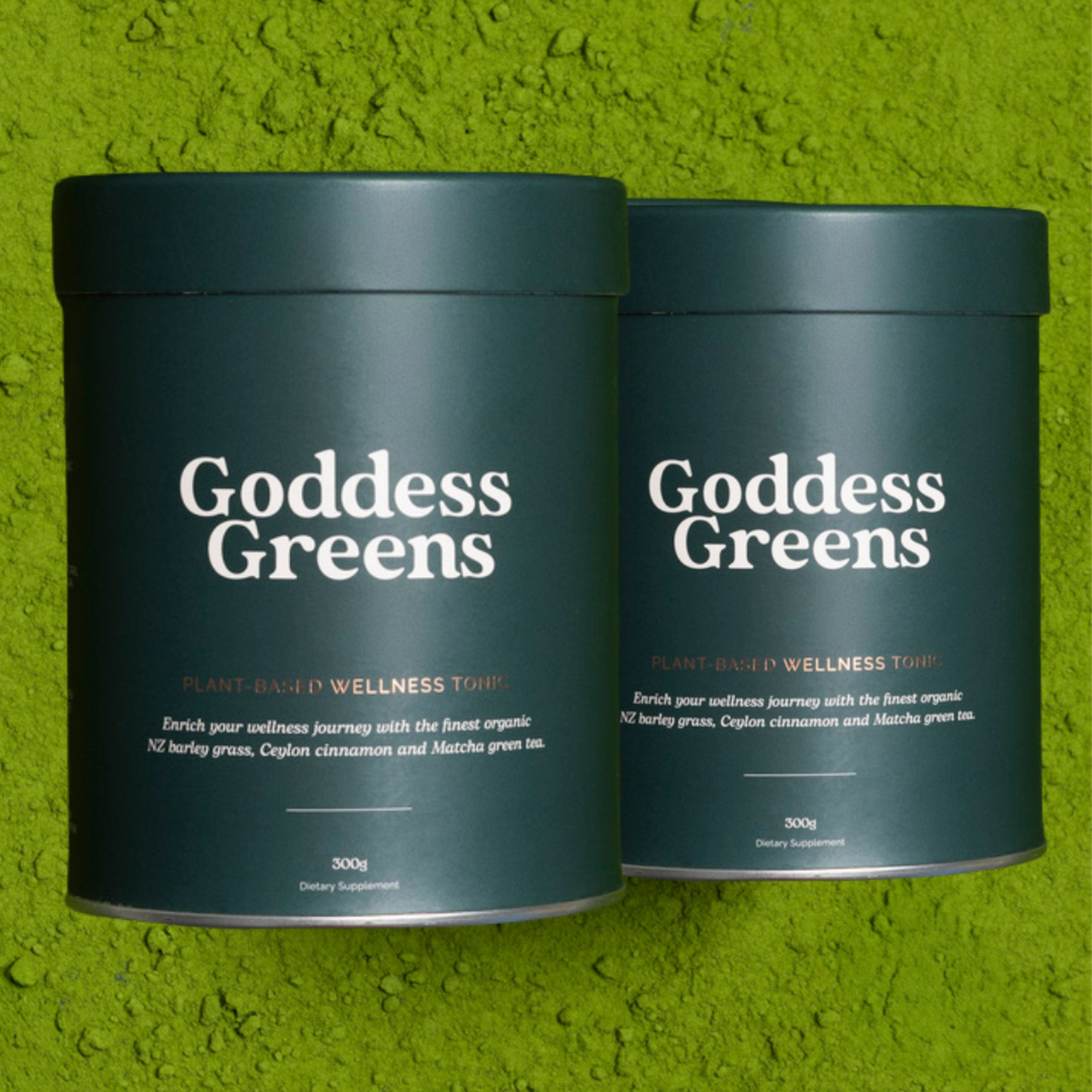 Two containers of 'Goddess Greens' on a green background